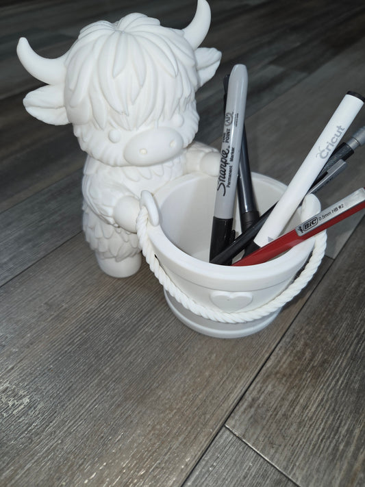 Cow with bucket pen holder